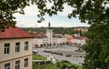 The Jan Amos Komensky town square in the centre of Fulnek Town, Czechia seen fron the hill behing the trees