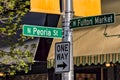 Fulton Market Street and Peoria Street direction information signs. Main street in Chicago