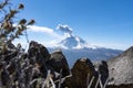 Active snowcapped Popocatepetl volcano with visible smoke, Mexico