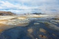 Fumarole field in Hverir geothermal zone Iceland. Famous tourist attraction Royalty Free Stock Photo