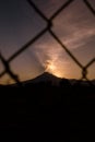 fumarole of the popocatÃ©petl volcano at sunset with red and orange colors Royalty Free Stock Photo