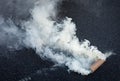 Fuming smoke bomb Royalty Free Stock Photo