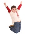 Fun boy in jeans high jump. Royalty Free Stock Photo