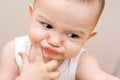 Fun caucasian baby with finger Royalty Free Stock Photo