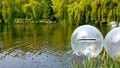 Fun children balls on the water, balls floating on the lake