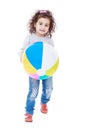 Fun curly-haired little girl playing ball Royalty Free Stock Photo