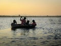 A fun evening coracle ride Royalty Free Stock Photo