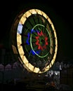 Fun fair Giant Colorful Ferris wheel spinning at night. Slow shutter image of a rotating giant wheel at night Royalty Free Stock Photo