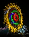 Fun fair Giant Colorful Ferris wheel spinning at night Royalty Free Stock Photo