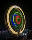 Fun fair Giant Colorful Ferris wheel spinning at night. Slow shutter zoom pan image of a rotating giant wheel at night Royalty Free Stock Photo