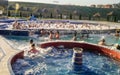 Fun with foam in the thermal water pool Royalty Free Stock Photo