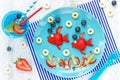 Fun with food - berry fruit fish on plate Royalty Free Stock Photo