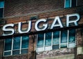 Signage on Building SUGAR for Foodie