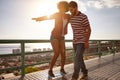 Fun friends: late afternoon skateboarding lessons Royalty Free Stock Photo