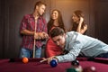 Fun with friends during playing billiard Royalty Free Stock Photo