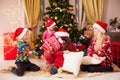 Fun and happy playtime at Chrismtas evening party Royalty Free Stock Photo