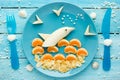 Fun and healthy food - fruit dolphin, summer season and sea vacation edible concept Royalty Free Stock Photo