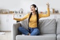 Fun At Home. Indian Female Listening Her Favorite Music In Wireless Headphones Royalty Free Stock Photo