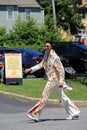 Fun image, with Colorful character dressed as Elvis, walking in July 4th Parade, Saratoga, New York,2016