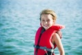 Fun at the lake girl with lifejacket