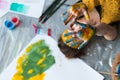 Fun leisure artist floor hands colorful paint