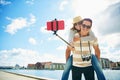 Fun loving young tourists taking a selfie