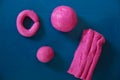 Fun plasticine texture painted on a modeling board. Toying with pink plasticine. Consists of the plasticine. Modeling figure. Lett Royalty Free Stock Photo