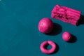 Fun plasticine texture painted on a modeling board. Toying with pink plasticine. Consists of the plasticine. Modeling figure. Lett Royalty Free Stock Photo