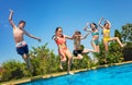 Fun in the pool group of kids jump inside water Royalty Free Stock Photo