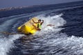 Fun riding banana boat. Royalty Free Stock Photo