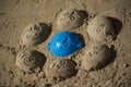 Fun sand faces of boys