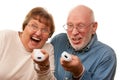 Fun Senior Couple Play Video Game with Remotes Royalty Free Stock Photo