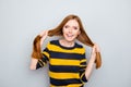 Fun stylish laughing yellow black redhead emotion expressing design stylist people funky fooling concept. Portrait of careless pr