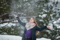 Happy teengirl playing with snow at winter Royalty Free Stock Photo