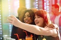 Fun times with my favorite person. young friends taking selfies while having drinks at a party. Royalty Free Stock Photo