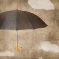 Fun umbrella on brown grungy background