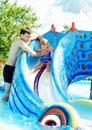 Fun in water park Royalty Free Stock Photo