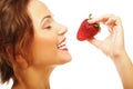 Fun woman with strawberry Royalty Free Stock Photo