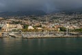 Funchal bay and Avenida do Mar with the buildings of the Marina Shopping and Baltazar Dias Theatre in  Madeira, Portugal Royalty Free Stock Photo