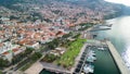 Funchal, Madeira. Aerial view of city center from a drone flying over the port Royalty Free Stock Photo