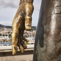 FUNCHAL, MADEIRA, PORTUGAL - MAY 22, 2021: Closeup of hand of bronze statue of Christiano Ronaldo