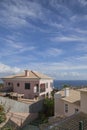 Funchal, Madeira, Portugal - pink homes and blue skies. Royalty Free Stock Photo