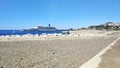 Funchal, Madiera port. Cruise ship departing.