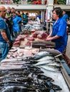 FUNCHAL, PORTUGAL 27.10.2018 Butcher prepares a tuna stack in Mercado dos Lavradores the famous fish and seafood market