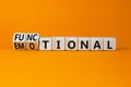 Functional or emotional symbol. Turned wooden cubes and changed the word emotional to functional. Beautiful orange background, Royalty Free Stock Photo