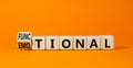 Functional or emotional symbol. Turned wooden cubes and changed the word emotional to functional. Beautiful orange table orange Royalty Free Stock Photo