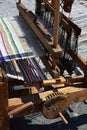 Functional historical wooden hand-loom weaving colorful mat with vertical lines displayed on festival of medieval and traditional Royalty Free Stock Photo
