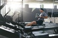 Functional Training. Man Doing Exercise On Rowing Machine At Gym Royalty Free Stock Photo