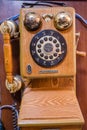 Functional vintage wall mounted telephone unit in good condition