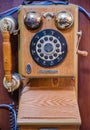 Functional vintage wall mounted telephone unit in good condition